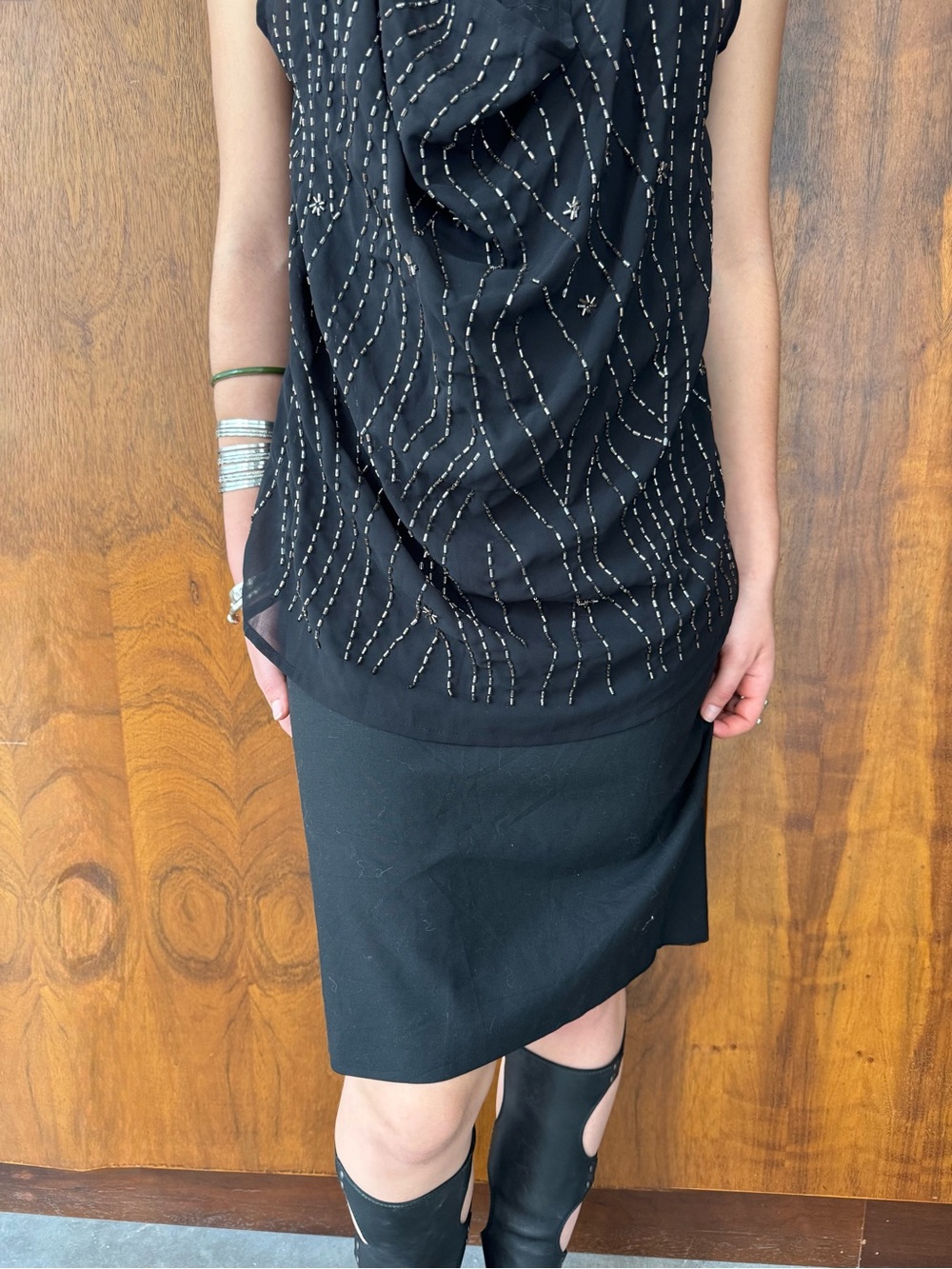 The Limited Black Midi Skirt with Asymmetric Hem